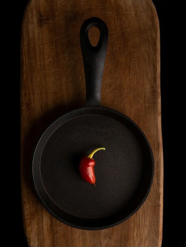 A pan baking upside down in an oven